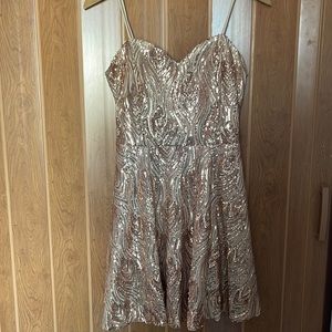 This is a gold sequence dress from Windsor